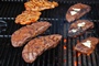 Kruidenboter op steaks en laten smelten